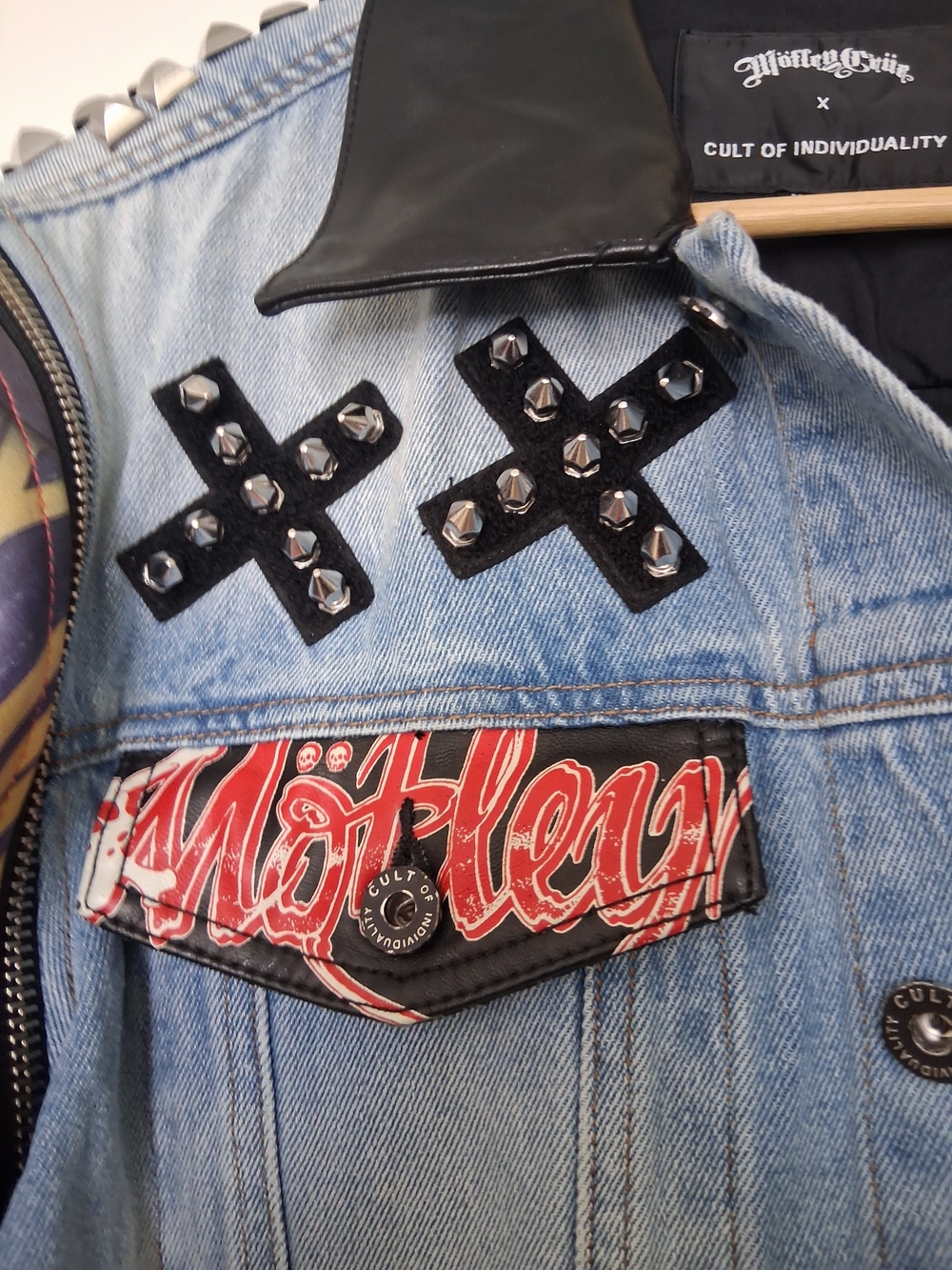 Cult of Individuality Blue Denim Patch Vest with Black Stud Accents and Red Logo